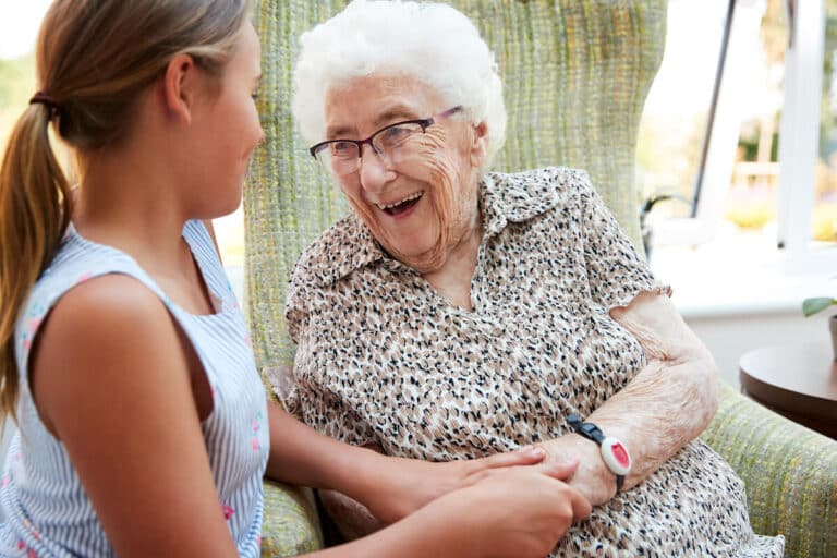 Older woman having quality time with granddaughter