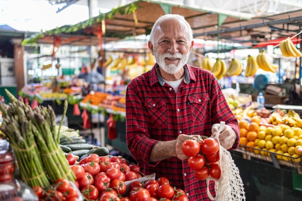 Senior shows off fresh produce at farmers market