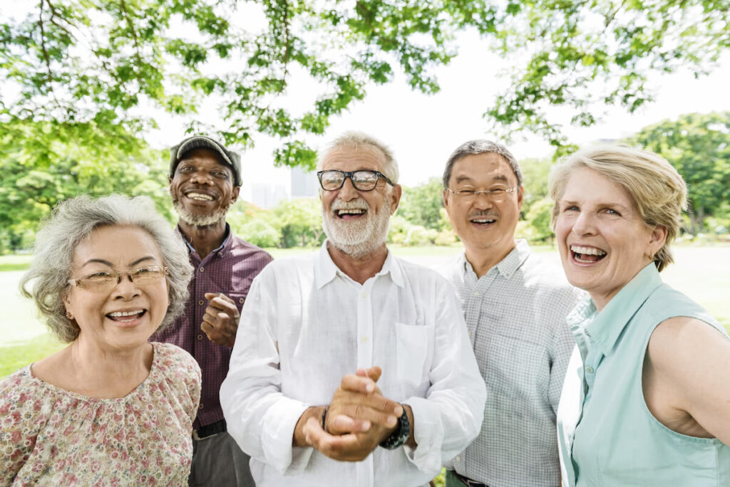 Group of seniors laughing outside