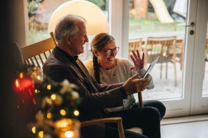 Older couple celebrating the holidays in a memory care setting