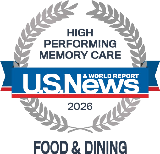 Award badge from US News & World Report 2026 for High-Performance Memory Care in Food & Dining, framed by a laurel wreath.